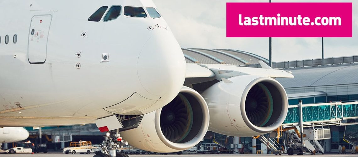 Traffic at the airport. Huge airplane is taxiing to the runway.